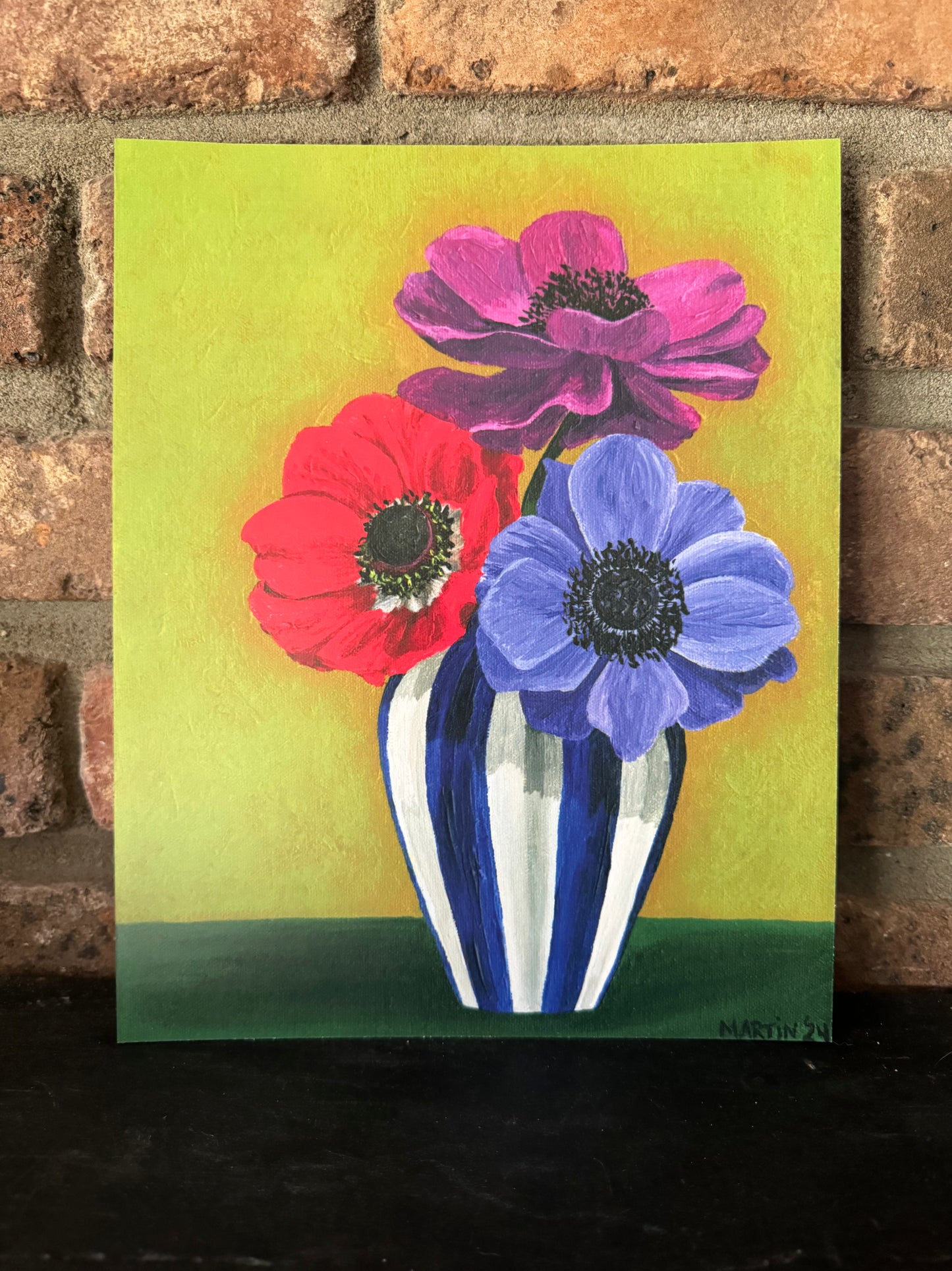 Three Anemones in Blue and White Striped Vase